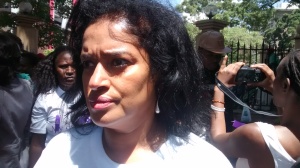 Esther Passaris matching with other protesters.